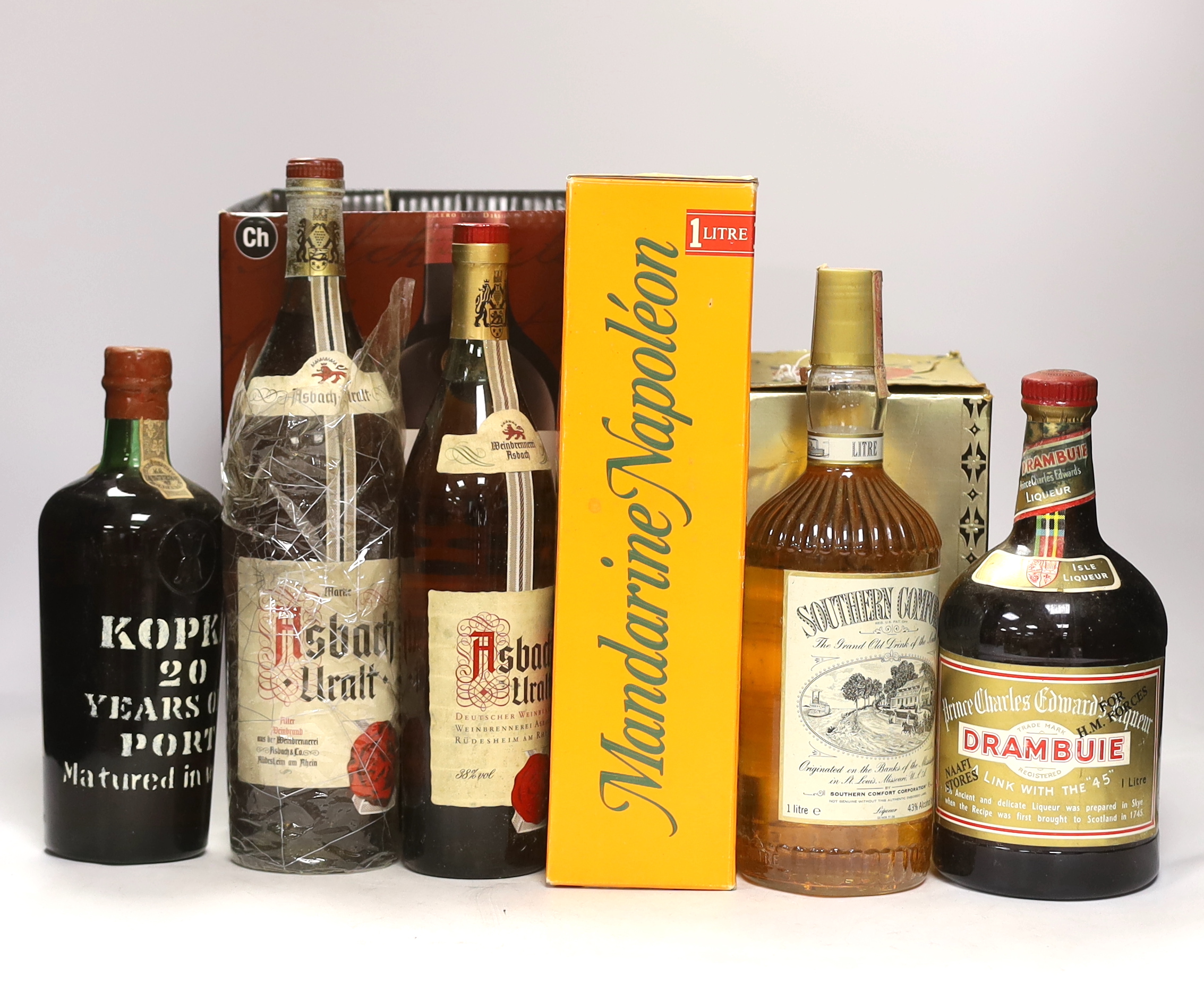 Eight bottles of spirits etc, including a bottle of Kopke 20 year old Port dated 1985